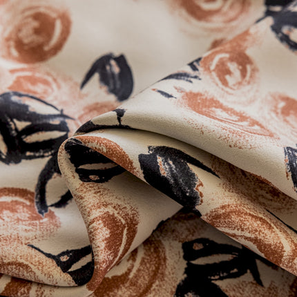 a close up of a fabric with a flower pattern