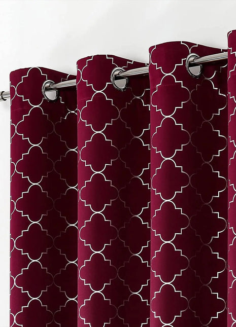 a close up of a curtain with a pattern on it