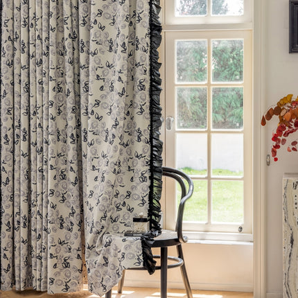 a chair sitting in front of a window