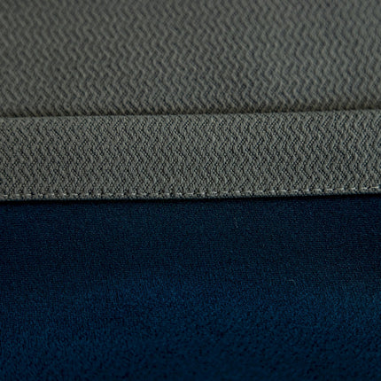 a close up of a blue and grey fabric