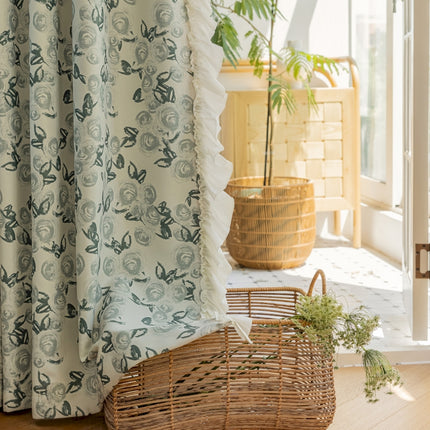 a basket sitting on the floor next to a window