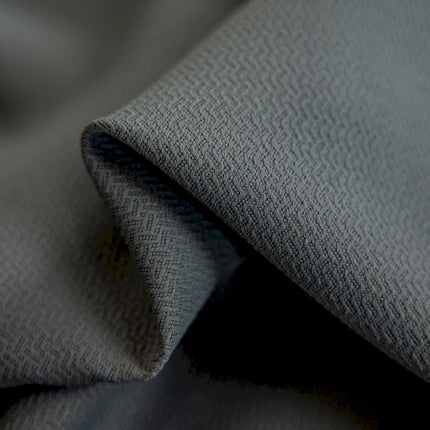 a close up of a gray fabric