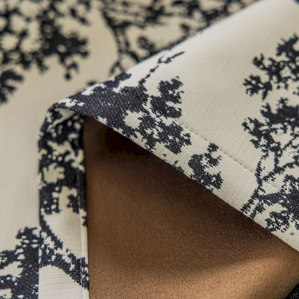 a close up of a black and white fabric