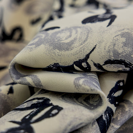 a close up of a black and white pattern on fabric